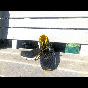 Under Armour Gemini. These guys are super light and soft. These are a WMNS 7.